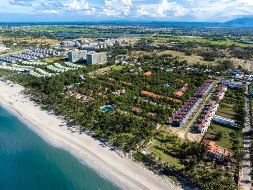 Hà My beach from the air, the hotel following the line of the sand